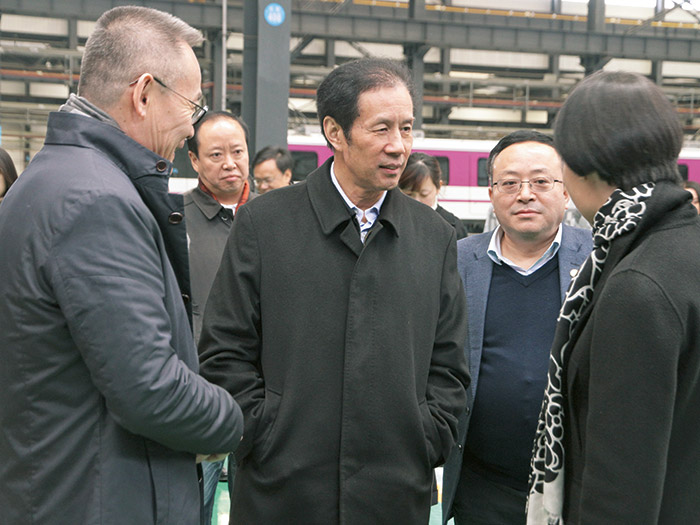  原四川省人大副主任陳光志一行蒞臨四川發展新筑股份調研指導工作,公司董事長肖光輝陪同